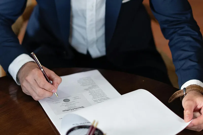 businessman signing contract